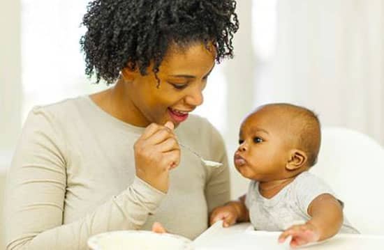 mum feeding baby